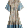 Sbc4b548fcd66433fb8981bba3c8a1319f.webp Free Spirit Bohemian Dress with Flowing Sleeves and Floral Detail