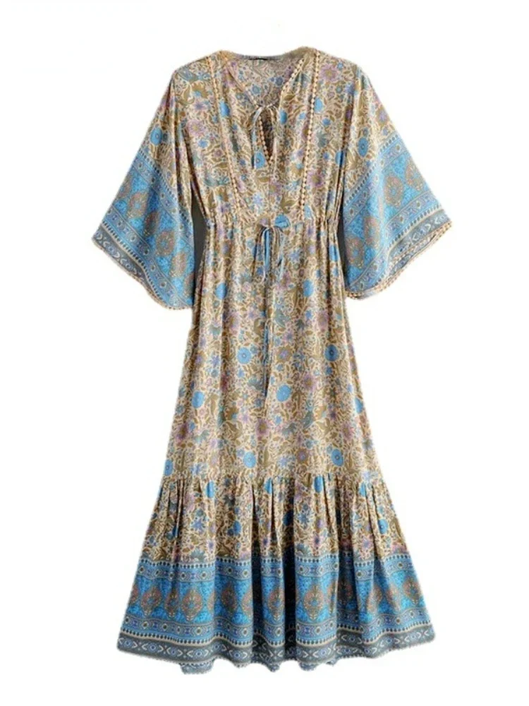 Free Spirit Bohemian Dress with Flowing Sleeves and Floral Detail