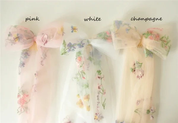 Sbe359f1bafb14d718847e4e40bf4d7faL.webp Romantic Whispers Bow Veil With Comb featured in Floral Embroidery