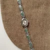 Sc26b88cfa8a042ed825891ec1affff2cm.webp Elysian Gemstone Embellished Wristwatch with Bracelet Strap