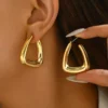 Sc2e56fd1009a412e989600612aa2a981Z.webp Irregular Crinkle Studs - Hammered Silver and Gold Earrings