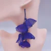 Scb209fbf1ec74292a1e4810e2575e817n.webp Floral Cascade Statement Dangle Earrings