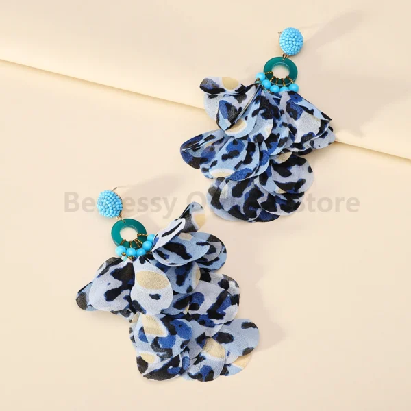 Sccafe5c9f029416181deac9a5d9bb7faI.webp Radiant Blooms Floral Statement Earrings with Layered Petals