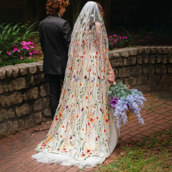 Scf285ae43615462ea8fb9d346869f189k.webp The Honeyblossom Veil, a wildflower wedding veil embroidered all over with poppies, daisies and ferns