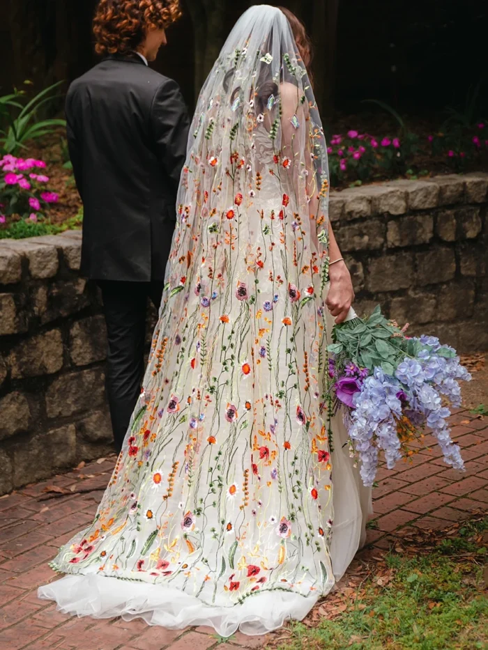 The Honeyblossom Veil, a wildflower wedding veil embroidered all over with poppies, daisies and ferns