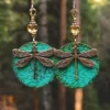 Sd0829eb3059f45c6a7d3de71ad2b13d44.webp Sunlit Garden Boho Earrings with Floral Accents and Textured Discs