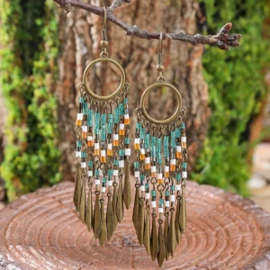 Sd0d2ba3882ee4fa981b742c7983c5fd2I.webp Dream Big Boho Earrings with Cascading Beads and Leaf Accents