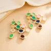 Sd41e1c32428c4253845f4ddfc83085d81.webp Colorful Statement Earrings with Cascading Gemstone Detail