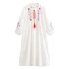 Sd5675bfd92c54452a6611615d24f7ca82.webp Folk-Inspired Embroidered Boho Maxi Dress | Tassel Tie & Puff Sleeves