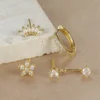 Sd6021623364043adb65c956e23fa0cfcd.webp Festive Glint Earring Set 4pcs with Crystal Accents – Spirit & Rebel