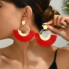 Sd6fb79dee46c4e00998a732f5c02aced7.webp Festival Spirit Fringe Hoop Earrings with Gold Accents
