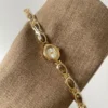 Sd7e420cc0f7b40e69673fda903230280C.webp Elysian Gemstone Embellished Wristwatch with Bracelet Strap