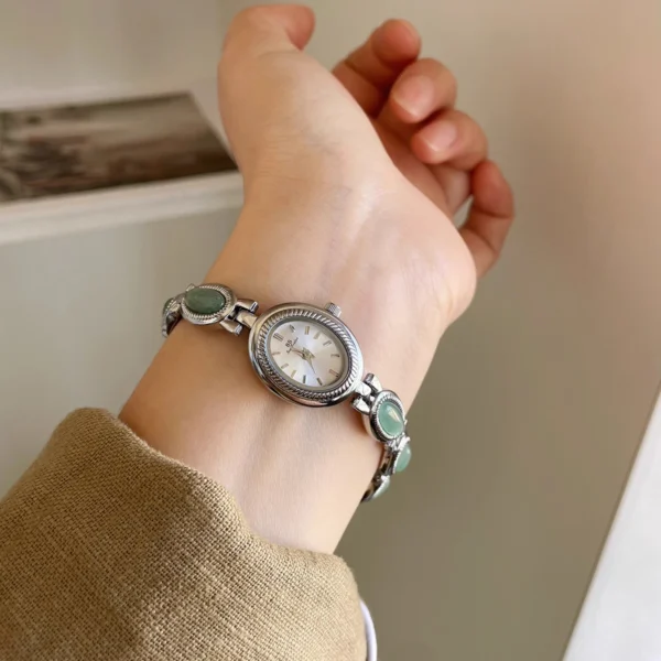 Sd9e414b8e00f4476a55c8aaab0d98978m.webp Elysian Gemstone Embellished Wristwatch with Bracelet Strap