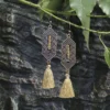 Sdb7ba03f810840d68d9f944fc568de83B.webp Odyssey Dangle Boho Tassel Earrings with Geometric Metal Accents