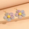 Se0b4eb841a844d0d9c7905e344dae023i.webp Textured Hand-Woven Raffia Bloom Earrings