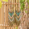 Se0f78450a83c4442b348dbc6c3318a9aA.webp Dream Big Boho Earrings with Cascading Beads and Leaf Accents