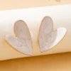 Se1955ce78c18477bb54425ecaf0ae2c5h.webp Sculpted Heart Statement Earrings