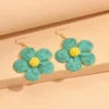 Se40688d601414c6a89f88b3de8ef7062F.webp Textured Hand-Woven Raffia Bloom Earrings