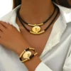 Se752174bef0043cdba3e92bee27da619N.webp Earthbound Textured Pendant Necklace and Bracelet Set