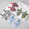 Se798f6aa78ae47a580424a8a78cd6781R.webp Radiant Blooms Floral Statement Earrings with Layered Petals