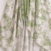 Sea447a97782b439a995e5e45fb6bc6f4N.webp Desert Bloom: Floral Print Backless Halter Maxi with Tassel Hem
