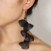 Sebeed29d1654486dada146b18c7b2cae9.webp Floral Cascade Statement Dangle Earrings