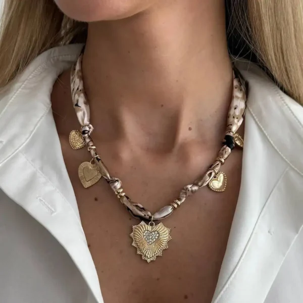 Sed66980c6bec4e80a4ab2c7af4931d3eV.webp Romantic Serenade Necklace Gold Heart Charm with Animal Print Ribbon