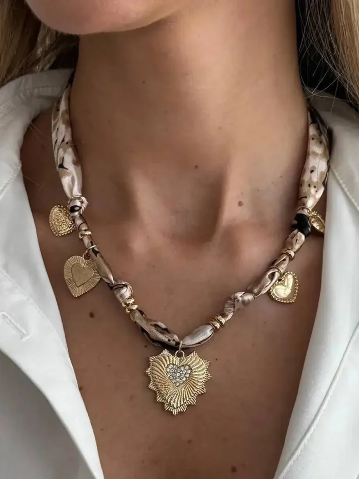 Sed66980c6bec4e80a4ab2c7af4931d3eV.webp Romantic Serenade Necklace Gold Heart Charm with Animal Print Ribbon