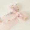 Seef9dab1fb3c4df0bec8fc546f836ccfV.webp Romantic Whispers Bow Veil With Comb featured in Floral Embroidery