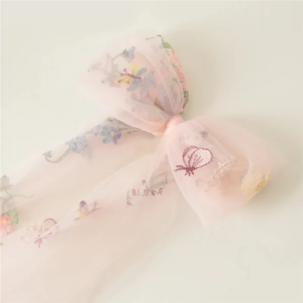 Seef9dab1fb3c4df0bec8fc546f836ccfV.webp Romantic Whispers Bow Veil With Comb featured in Floral Embroidery
