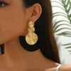 Sef77081890b04453aa24c05e73c6eaa9A.webp Radiant Sunburst Tassel Statement Earrings