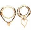 Sf76e2ee55a44407ea2ec325f454a40b8b.webp Heart Leopard Boho Necklace with Layered Pendant Design