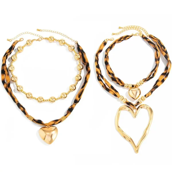 Sf76e2ee55a44407ea2ec325f454a40b8b.webp Heart Leopard Boho Necklace with Layered Pendant Design