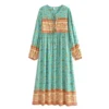 Sf8dbe5eff28f424c922095b09fc0010fe.webp Wilderness Boho Floral Bohemian Dress with Tassels and Tie-Front