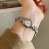 Sfd66e23a5d6048b8be5e5597354b2f761.webp Elysian Gemstone Embellished Wristwatch with Bracelet Strap