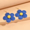 Sff0d08aab8b2444ba453f21148f228e0D.webp Textured Hand-Woven Raffia Bloom Earrings
