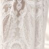 The Alba Veil, an ivory tassel fringe wedding veil in floral lace with a scalloped border
