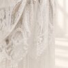 The Alba Veil, an ivory tassel fringe wedding veil in floral lace with a scalloped border