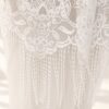 The Alba Veil, an ivory tassel fringe wedding veil in floral lace with a scalloped border
