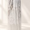 The Alba Veil, an ivory tassel fringe wedding veil in floral lace with a scalloped border