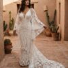 spirit_western_bride_in_adobe_courtyard The Open Range Bride - Western Lace Wedding Dress