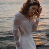 ai-edited-1772913867848-3 Celestial Sands Long Sleeve Lace Gown