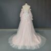ai-edited-1772918916589-2 Romantic Pink Embroidered Bridal Gown with Floral Accents