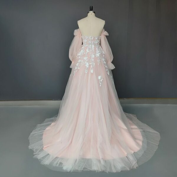ai-edited-1772918916589-2 Romantic Pink Embroidered Bridal Gown with Floral Accents