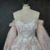 ai-edited-1772918917865-3 Romantic Pink Embroidered Bridal Gown with Floral Accents