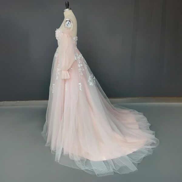 ai-edited-1772918923676-6 Romantic Pink Embroidered Bridal Gown with Floral Accents