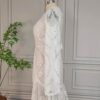 ai-edited-1776339283921-8 Desert Romance Fringe Lace Wedding Dress