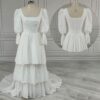 ai-edited-1776599936672-2 Vintage Broderie Anglaise Wedding Dress with Tiered Eyelet Lace Skirt