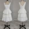 ai-edited-1776599939653-4 Vintage Broderie Anglaise Wedding Dress with Tiered Eyelet Lace Skirt