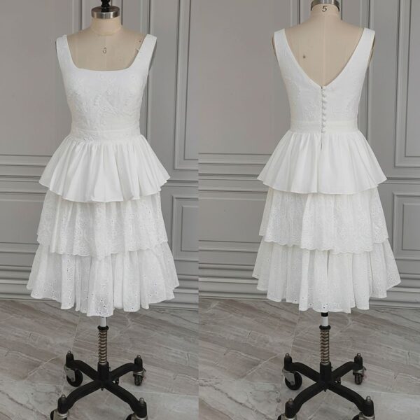 ai-edited-1776599939653-4 Vintage Broderie Anglaise Wedding Dress with Tiered Eyelet Lace Skirt